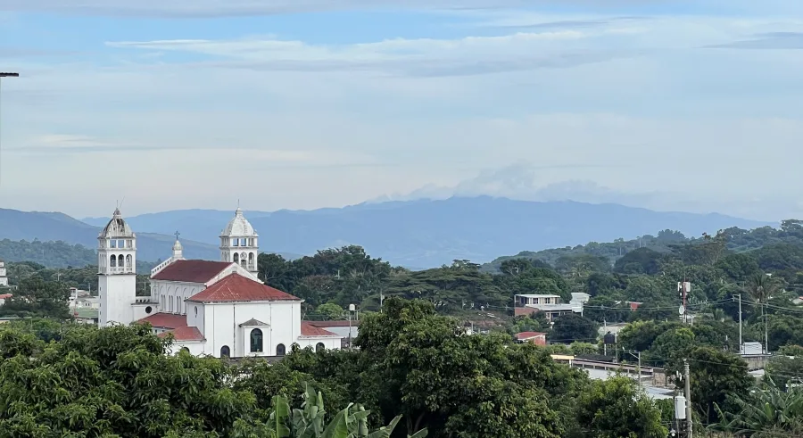 distant view of a church and mountains
